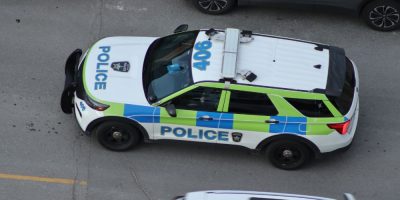 A Barrie Police cruiser drives north on Maple Avenue. May 22, 2026.