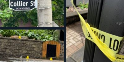 Barrie police tape and evidence markers outside an apartment building near Worsley and Poyntz streets where a 64-year-old man was found unconscious and later died.