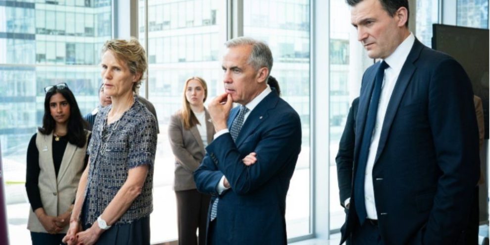 Prime Minister Mark Carney, Artificial Intelligence Minister Evan Solomon and Diana Fox Carney tour tech startups at the Vector Institute in Toronto on June 4, 2026, discussing Canada’s new AI strategy and digital policy initiatives.