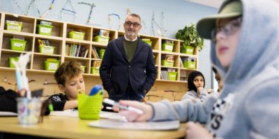 Ontario Education Minister Paul Calandra observes a Grade 6 math class during a school visit at Wazoson Public School in Ottawa