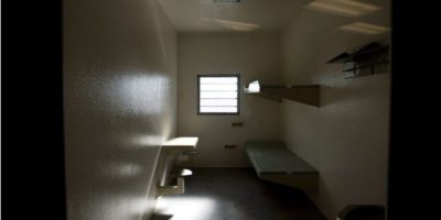 Interior of a correctional facility inmate cell at Toronto South Detention Centre, highlighting the confined conditions in Ontario jails referenced in a coroner’s report on correctional worker suicides and overcrowding pressures.