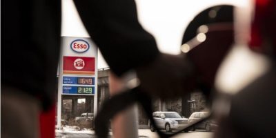 A driver fills up a vehicle at a Montreal gas station as fuel prices rise, contributing to higher inflation across Canada in May 2026.