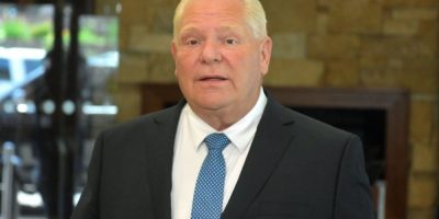 Ontario Premier Doug Ford speaks to reporters at a Council of the Federation meeting in Charlottetown.