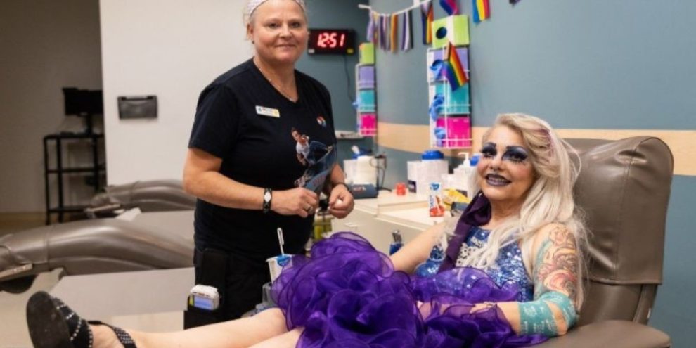 A blood donor and a Canadian Blood Services representative pose at a blood donation event in Halifax.