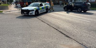 Barrie Police cruiser involved in collision with van on Dunlop Street West at Boys Street in Barrie