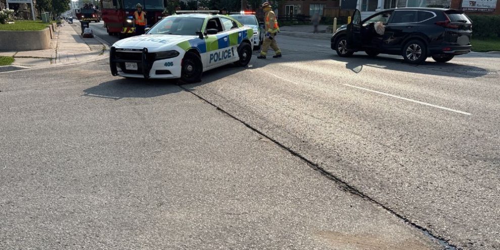 Barrie Police cruiser involved in collision with van on Dunlop Street West at Boys Street in Barrie