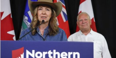 Alberta Premier Danielle Smith and Ontario Premier Doug Ford announcing a proposed pipeline route at the Calgary Stampede.