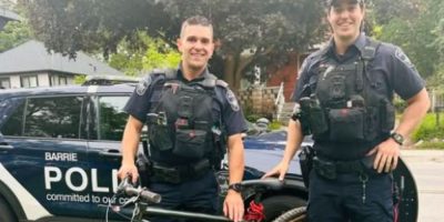 Barrie police officers return a recovered bicycle to a young boy after it was stolen from his east-end home