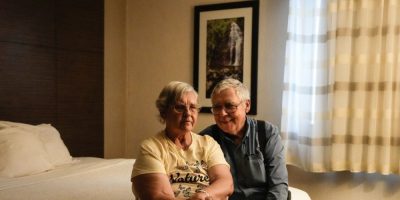 Ella and Basil Arney sit in their Thunder Bay hotel room after being evacuated from McKenzie Lake due to the threat of wildfires.