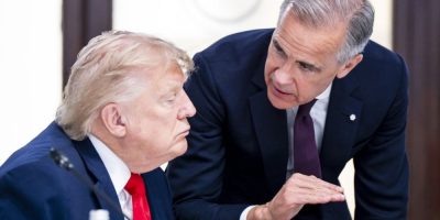 Prime Minister Mark Carney and U.S. President Donald Trump speak at a G7 working luncheon in France.