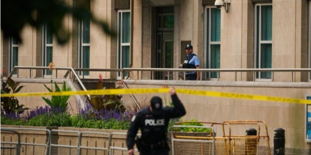 Police investigate outside the U.S. Consulate in Toronto after an early morning shooting on July 27, 2026.