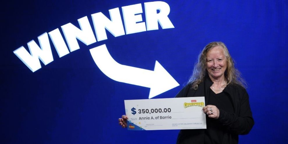 Barrie woman Annie A. celebrates $350,000 Crossword Extreme Scratch Ticket win. Image supplied by OLG.