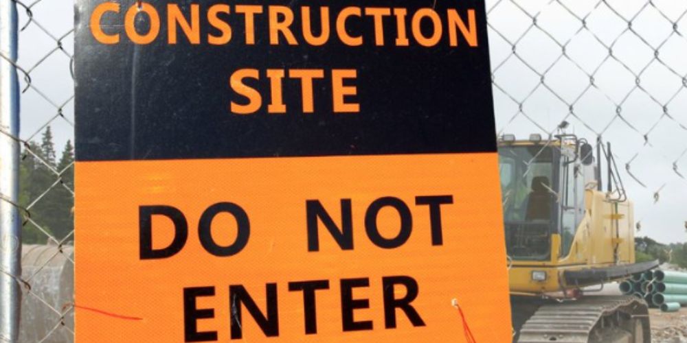 Six youths charged after found at Bradford construction site