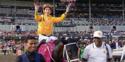 Jockey Pietro Moran rides Mansetti to victory in the King's Plate horse race in Toronto in August 2025.