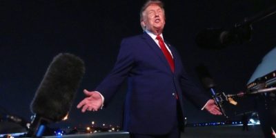 U.S. President Donald Trump speaks to reporters after arriving at Joint Base Andrews