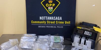 OPP and South Simcoe Police vehicle following drug trafficking investigation in Innisfil