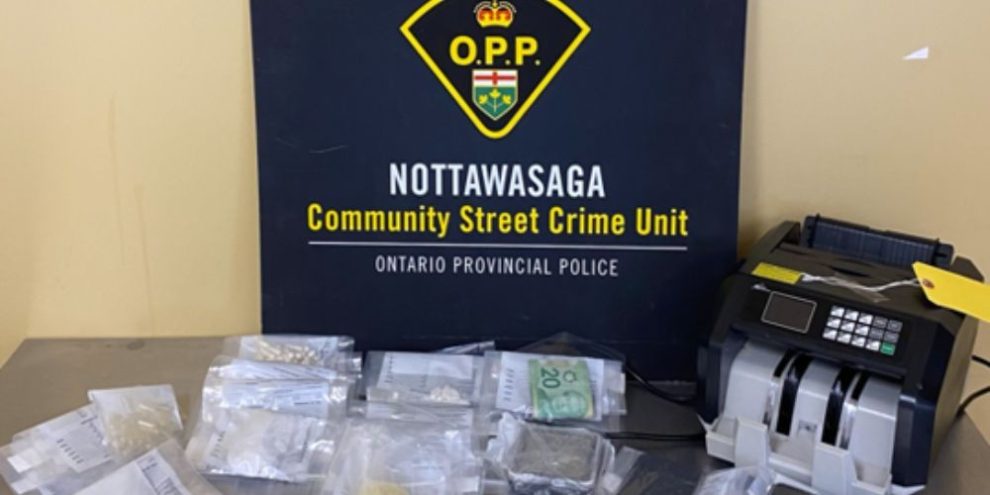 OPP and South Simcoe Police vehicle following drug trafficking investigation in Innisfil