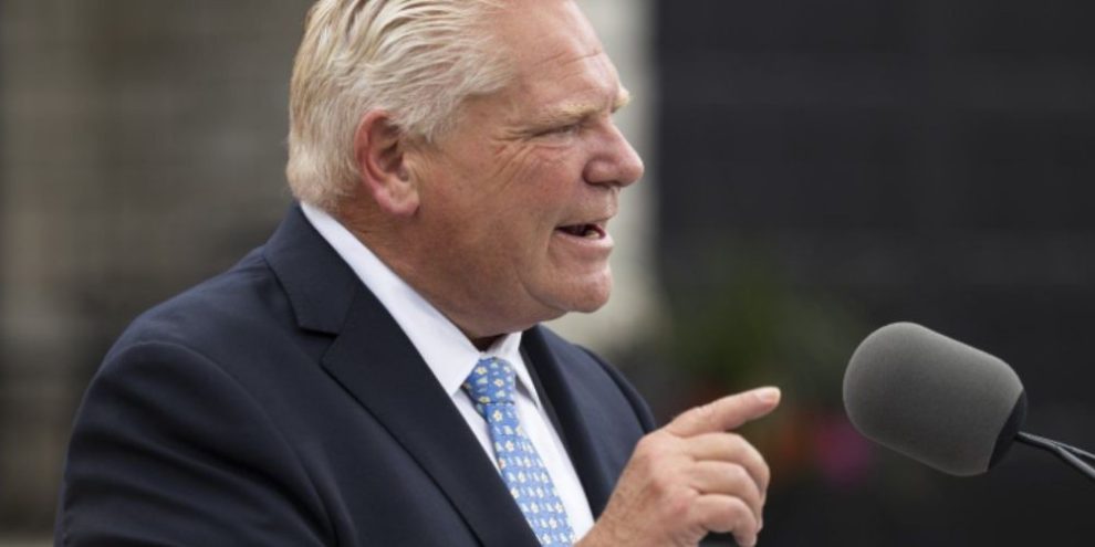 Ontario Premier Doug Ford speaks to media at a housing development in Hamilton on Aug. 24, 2026.