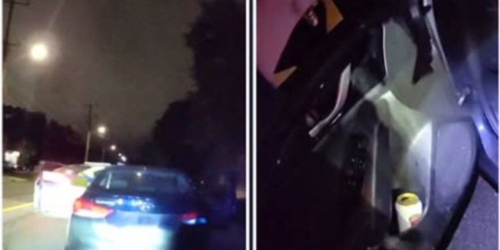 Vehicle pulled over by Barrie Police with a beer can visible in the driver's side door.