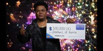 Barrie business owner wins $100K ENCORE prize and celebrates with a dance in the store