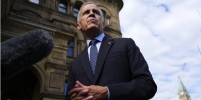 Prime Minister Mark Carney speaks to reporters outside his Ottawa office on Sept. 1, 2026