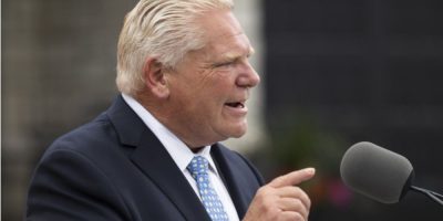Ontario Premier Doug Ford speaks to media at a housing development in Hamilton.