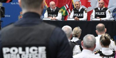 Toronto police Chief Myron Demkiw, York Regional Police Chief Jim MacSween and Deputy Chief Ryan Hogan at a Project South press conference in Aurora
