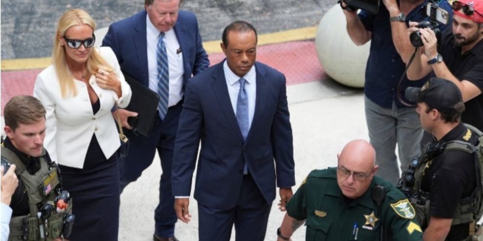 Tiger Woods arrives at court with Vanessa Trump for his plea hearing in Florida