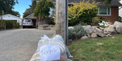 Textile collection bags are left at the curb in Barrie.