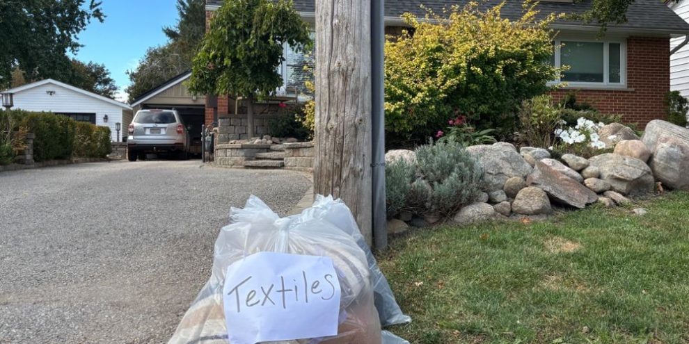 Textile collection bags are left at the curb in Barrie.