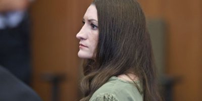 Lindsay Clancy watches jurors enter the courtroom during her murder trial