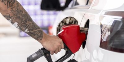 Person pumps gas at a Montreal gas station on April 2, 2026.