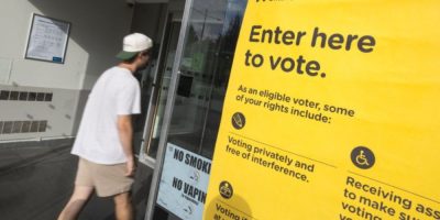 Voter enters an advance voting location in Hamilton ahead of the Ontario byelections