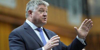 Parry Sound-Muskoka MP Scott Aitchison rises during question period on Parliament Hill in Ottawa on June 18, 2026.