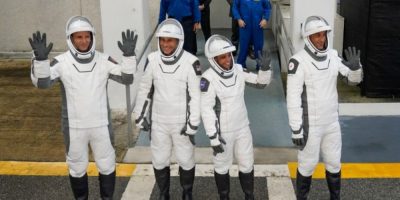 Canadian astronaut Joshua Kutryk, pilot Luke Delaney, commander Jessica Watkins and Russian cosmonaut Sergey Teteteryatnikov leave the Operations and Checkout Building at Kennedy Space Center in Florida.