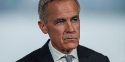 Prime Minister Mark Carney listens during an announcement about funding for oceans protection in North Vancouver on Sept. 29, 2026.