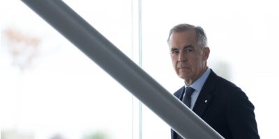 : Prime Minister Mark Carney walks to a news conference in Istanbul, Turkey, on October 23, 2026.