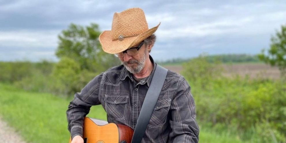 Barry James Payne playing guitar