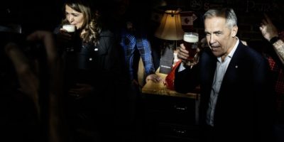 Prime Minister Mark Carney attends a national unity rally in Red Deer with Alberta Premier Danielle Smith on October 16, 2026.